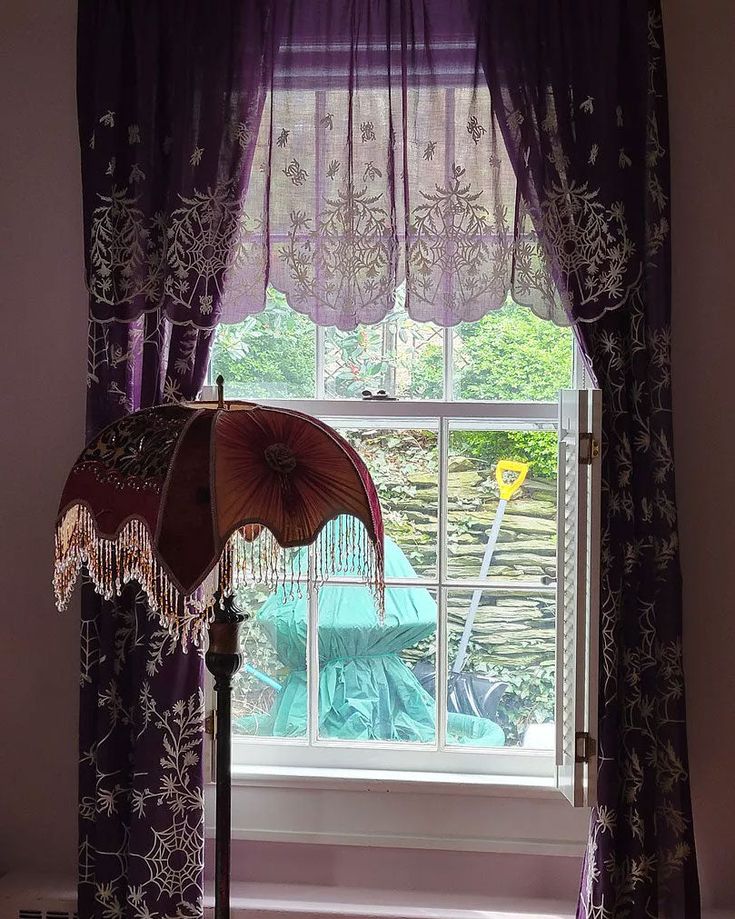 dark plum curtains with lamp