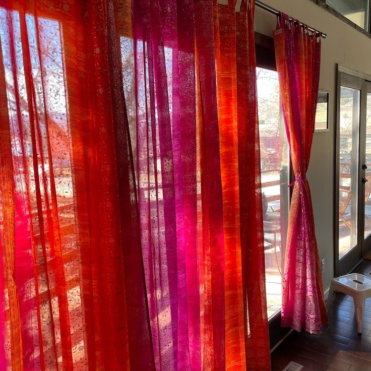 red and fushia shifting curtains